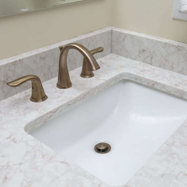 Brushed Gold Bathroom Faucet at His and Hers Sinks | Louisville Handyman and Remodeling